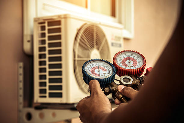 Professional Hvac Repair technician working in Ames, TX